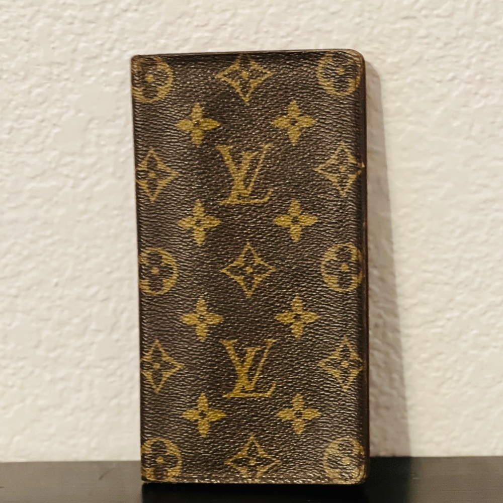 SOLD…Authentic Louis Vuitton long bifold wallet.